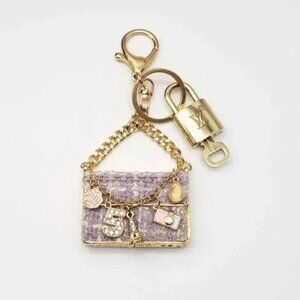 100% Auth Louis Vuitton Lock & Key with unbranded Bagcharm, Keycharm, Keychain